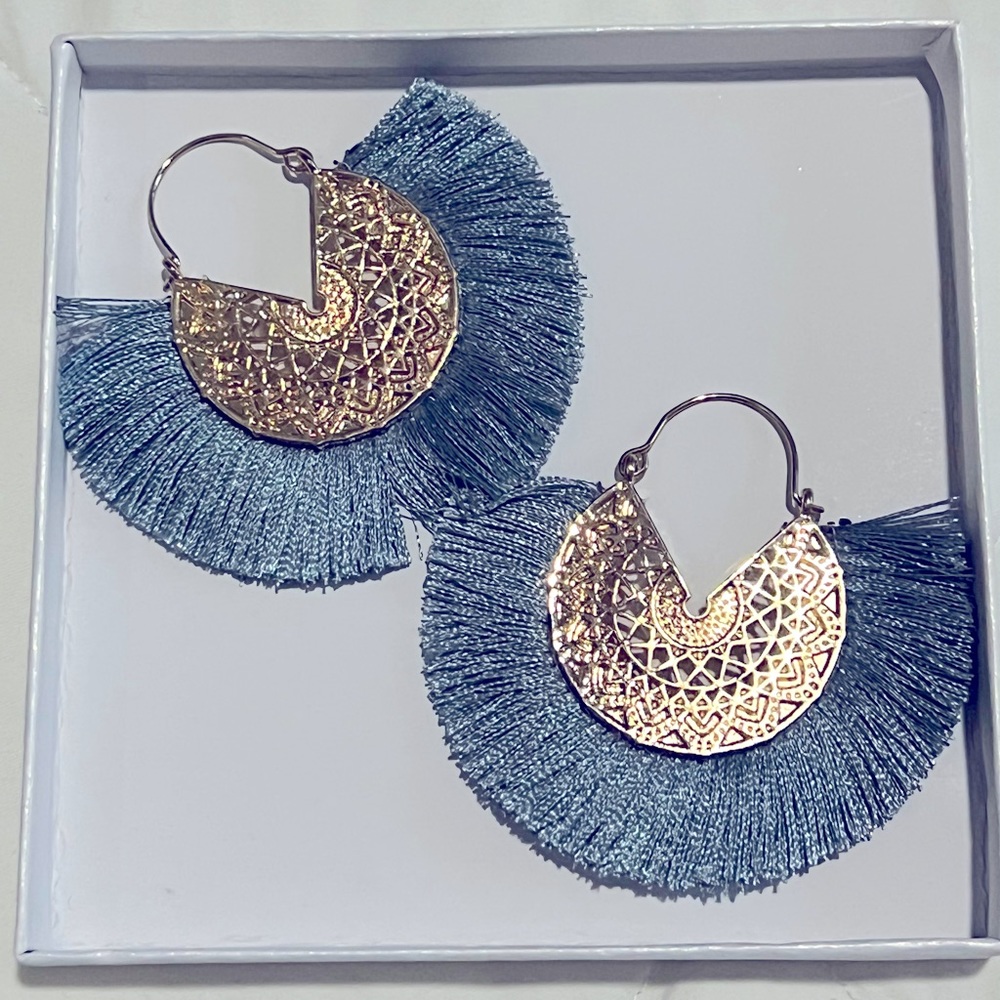 Fan earrings.